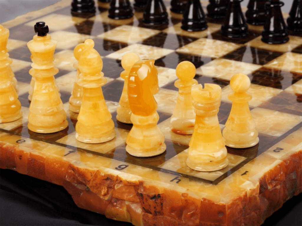 Amber Royal Chess close-up – handcrafted amber chess pieces and board details